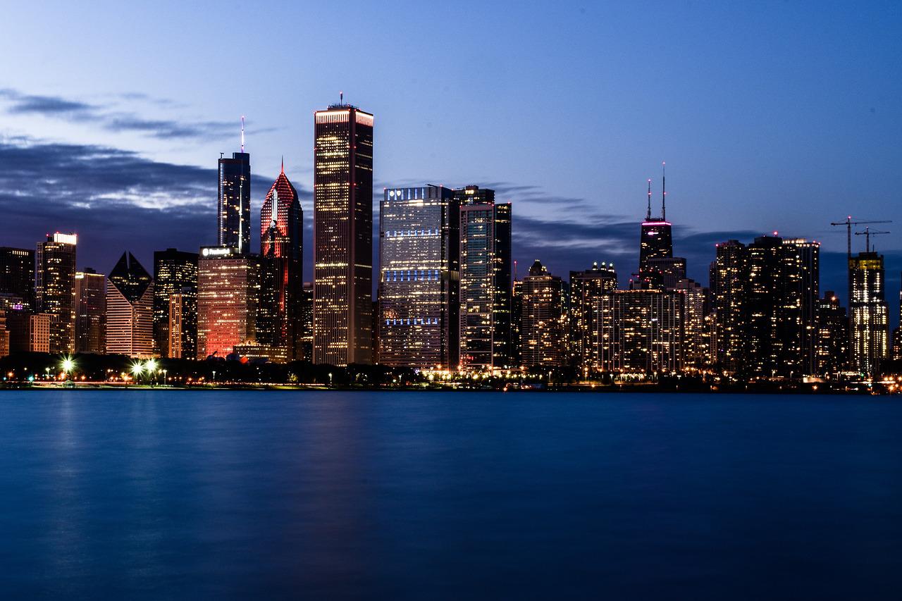 The Chicago skyline at dusk seen across the lake